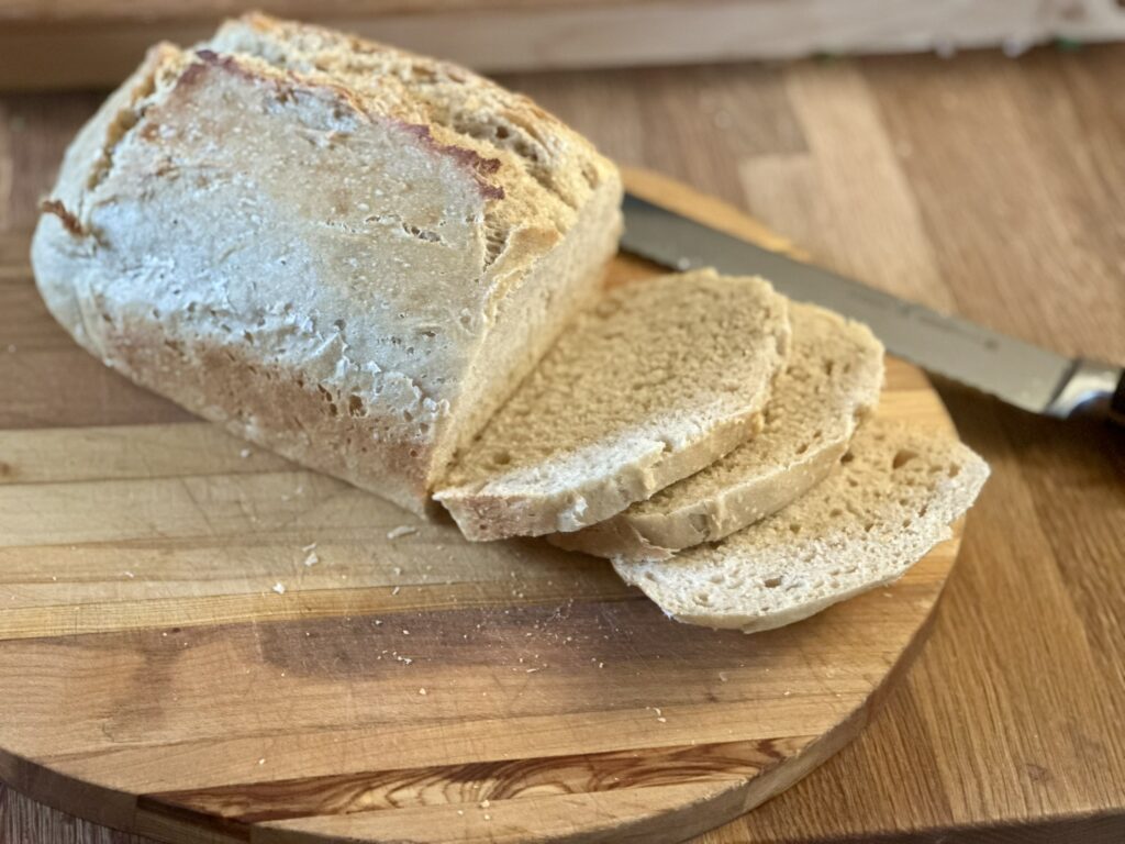 Sliced bread on cutting board